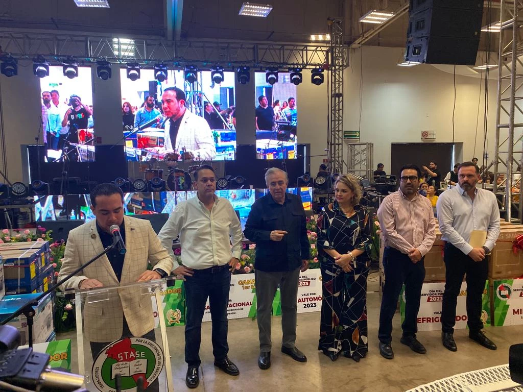 El STASE celebra a sus trabajadores en su día, con rifa de autos y casa