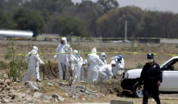 Aumenta a 18 número de cuerpos embalados y congelados encontrados en oriente de México